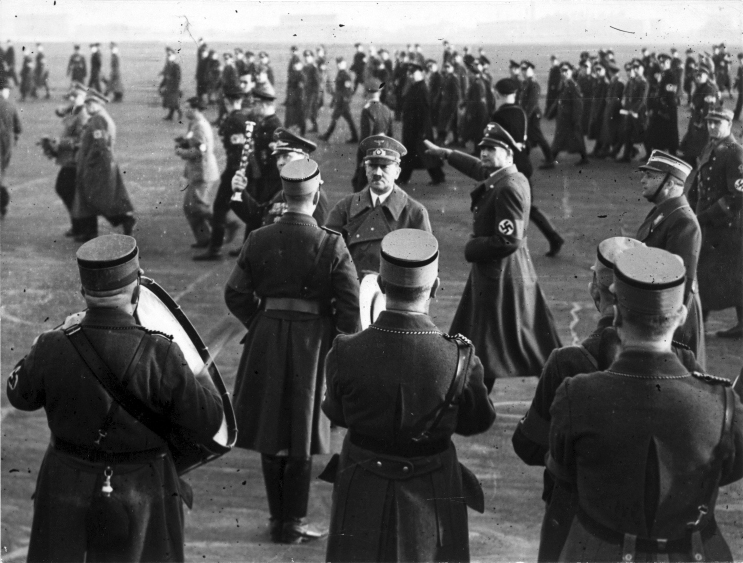Adolf Hitler arrives in Berlin after his flight from Austria after the Anschluss